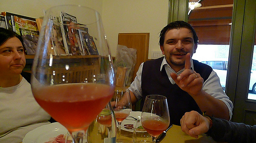 Winemaker Alberto Paltrinieri enjoying lunch with one of his delightful Lambruscos