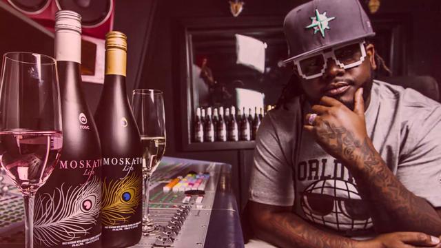 Questionably talented rapper T-pain promoting the bile-inducing beverage that is Moskcato Life.