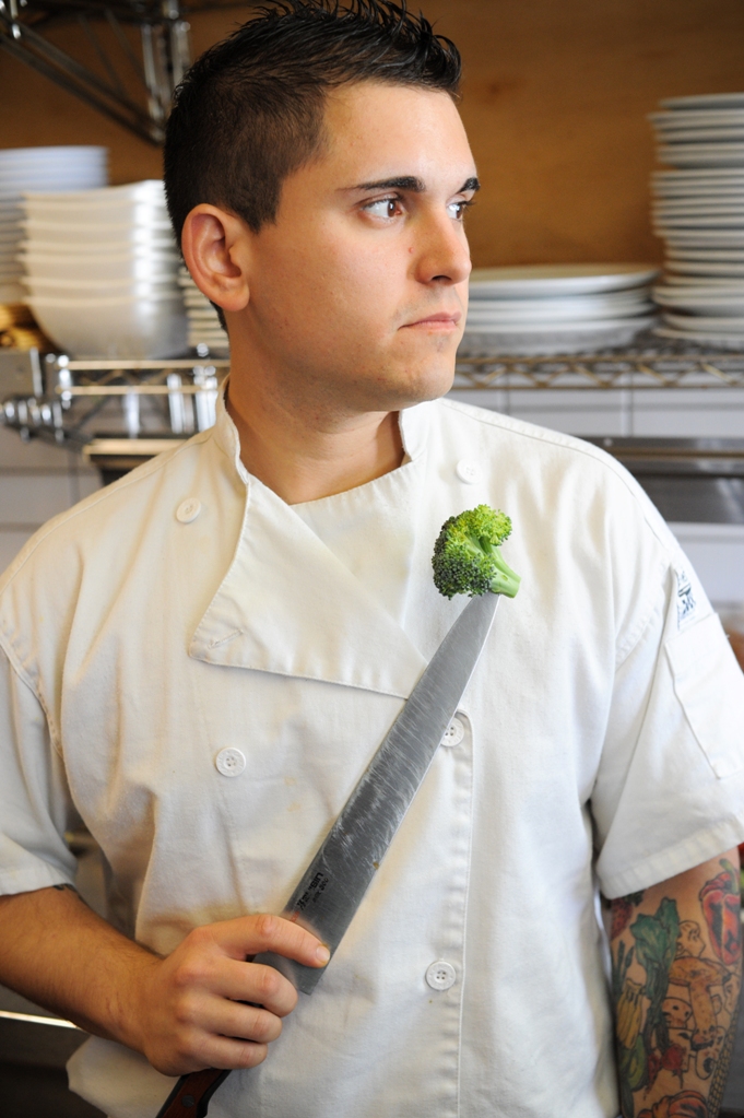 Vegan Chef Doug McNish working on some Broccoli.
