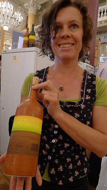Maria Muster proudly displays one of her clay bottles at Vienna's Vivinum earlier this year.