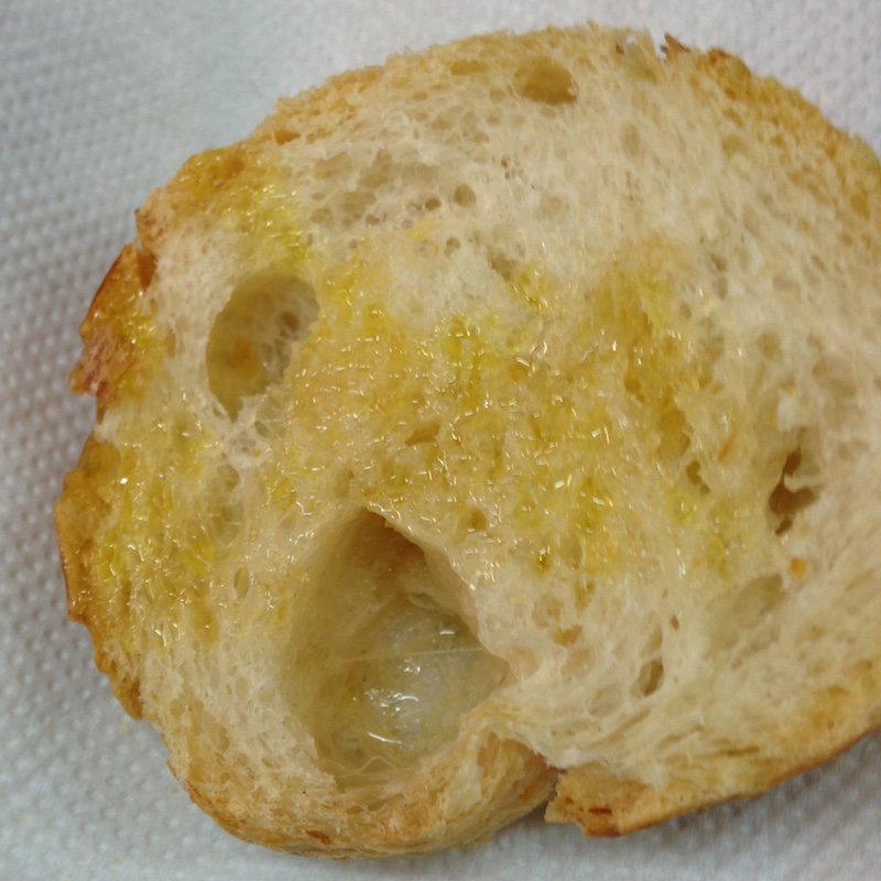 Bread saturated with colatura aka Neapolitan fish sauce.
