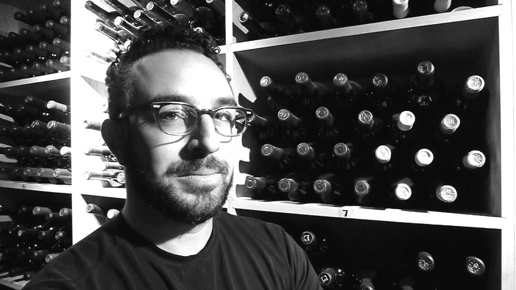 A very serious-looking Jascha Baraness in Barberien's wine cellar.