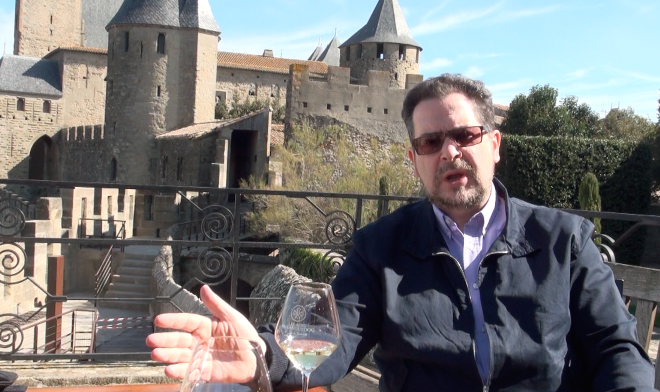 UK Winewriter Quentin Sadler relaxes with a glass of Languedoc white in the walled city of Carcassonne.