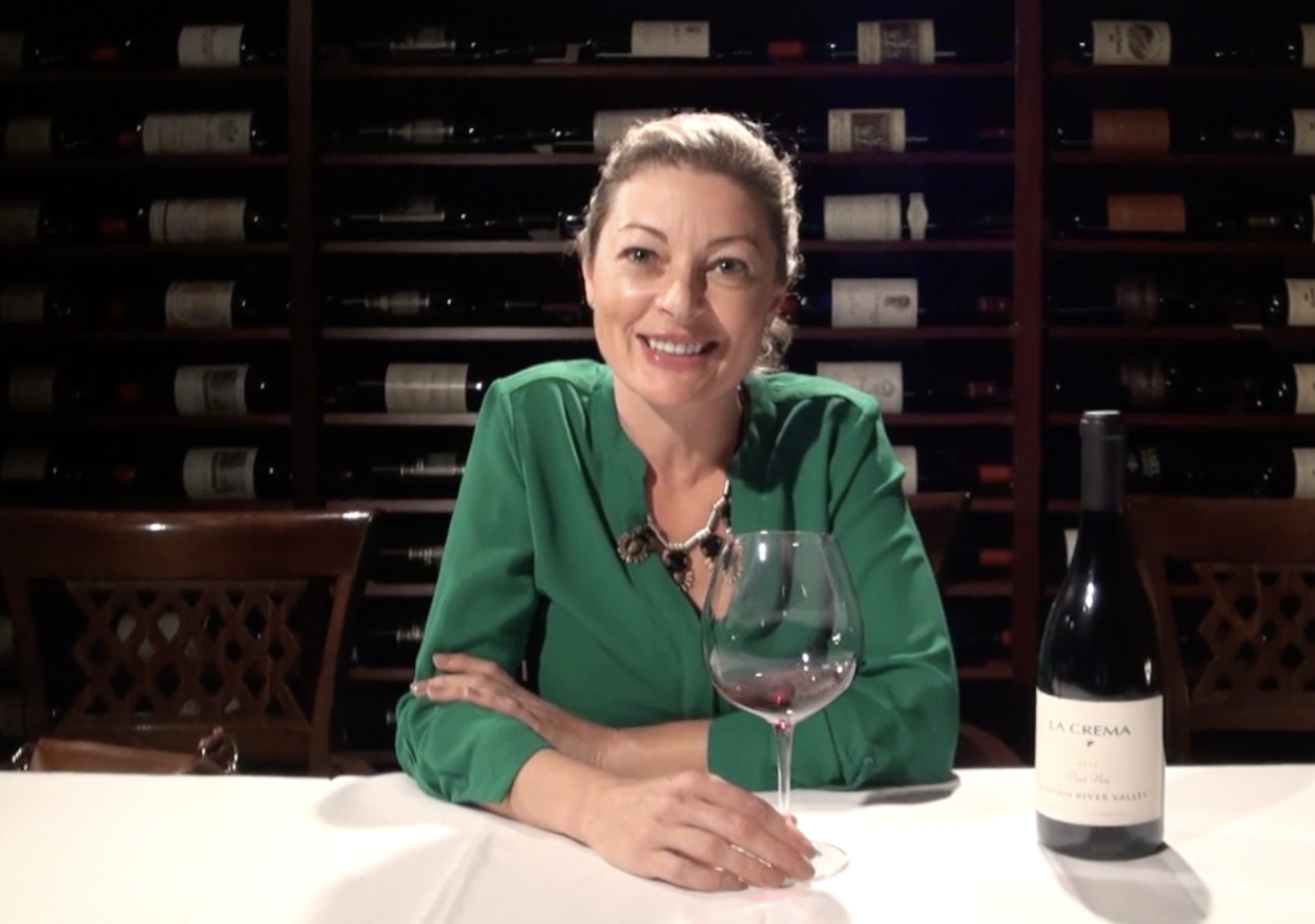 Jennifer Huether MS enjoying a glass of La Crema Pinot Noir in Barberian's cellar.