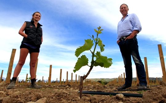 Emma and Brent Marris walk their vineyards at Marisco located in New Zealand's Waihopai Valley.