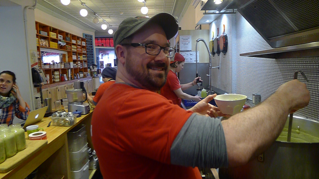 Kendall Collingwood cooking up some mighty fine, warming chowder at Hooked in Leslieville.