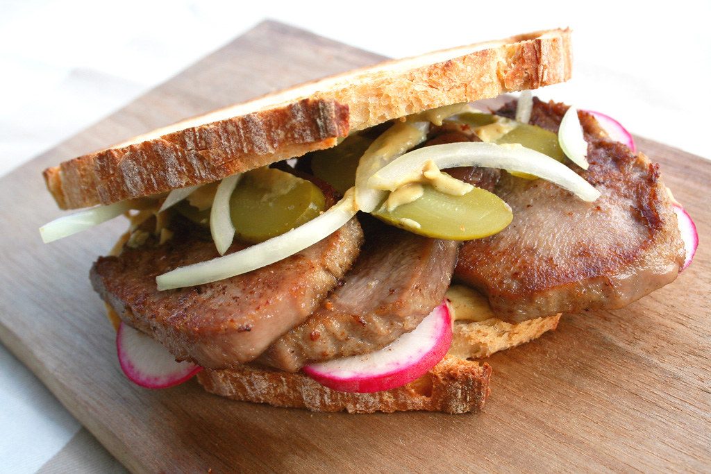 Probably one of my favourite ways to serve tongue is giving it a quick grill and shoving it inside some decent bread for a delicious sandwich. This gorgeous pic is courtesy of www.thegluttonlife.com