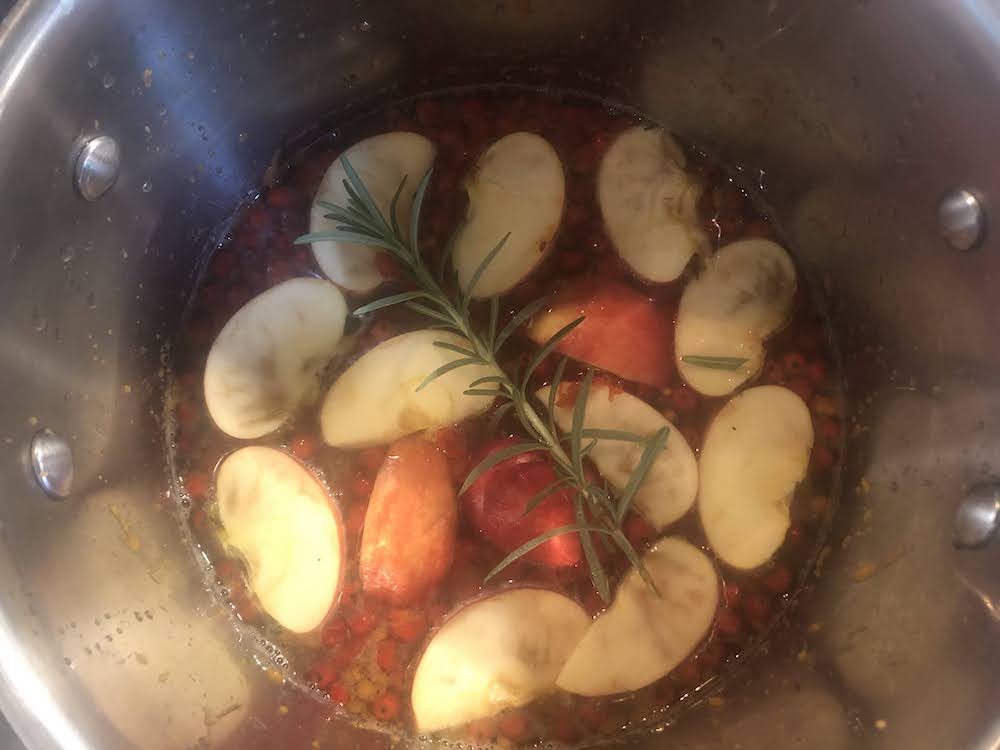 Just cover the fruit, as if you put in too much you'll just have to spend time reducing all the excess liquid. Pro-tip: add a little fresh rosemary.
